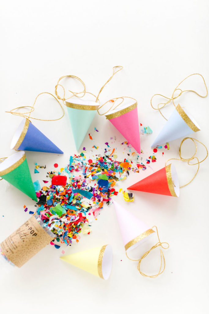 a bunch of party hats celebrating a new year and word of the year